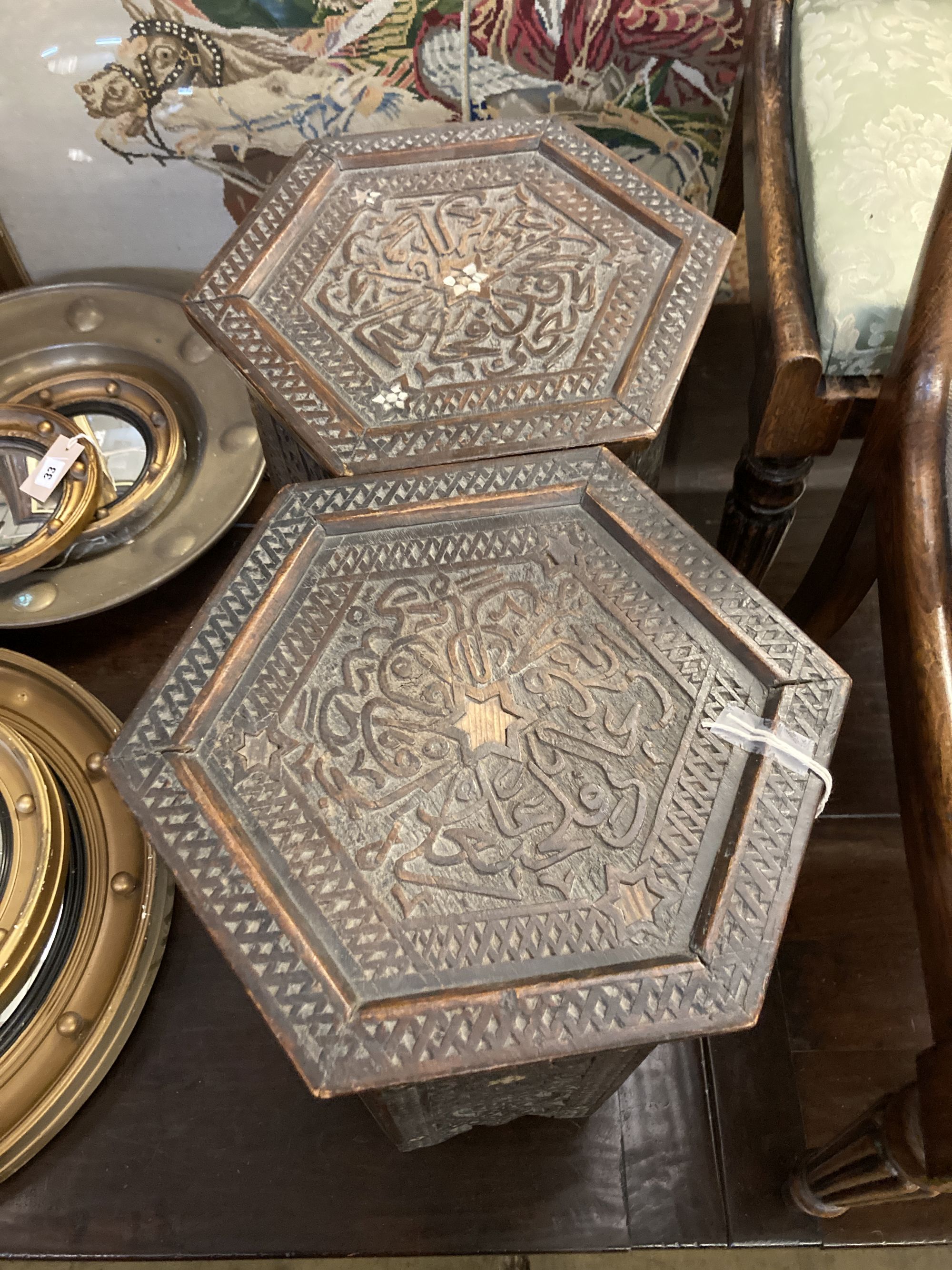 A near pair of Moorish hexagonal hardwood occasional tables, width 30cm height 46cm